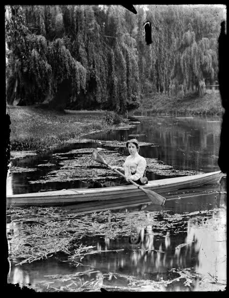 Woman in a canoe on the Avon River, 1900