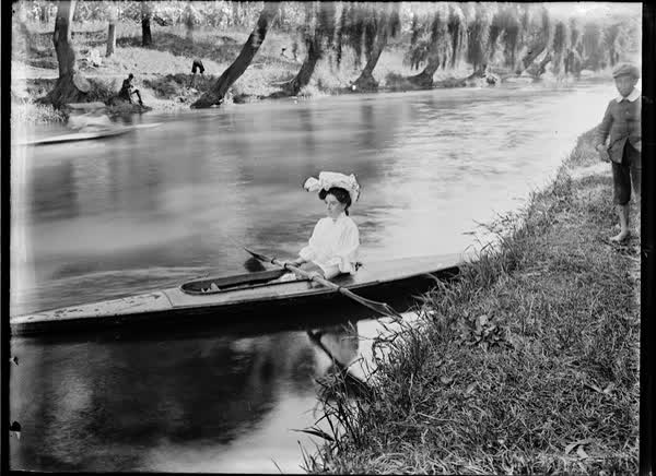 Woman in a canoe on the Avon River, 1900