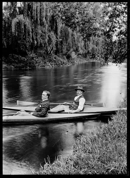 Two men in canoes on the Avon River, 1900