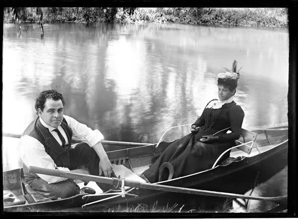 Man and woman in a rowboat on the Avon River, 1900