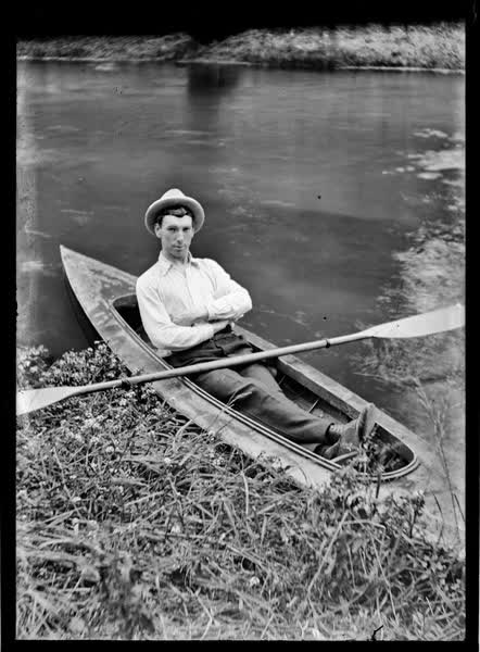 Man in a canoe on the Avon River, 1900