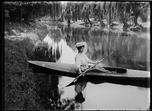Woman in a canoe on the Avon River, 1900