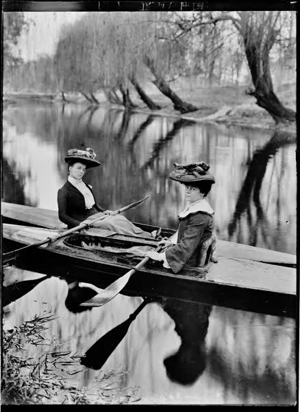 Two women in canoes on the Avon River, 1900