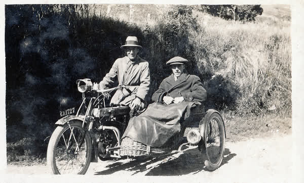 William and Arthur Cyril Pearce on a motorbike, 1920