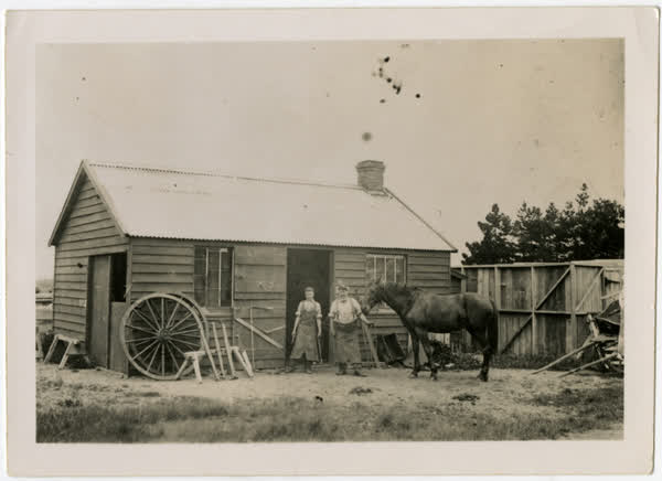 Outside the blacksmith, 1890