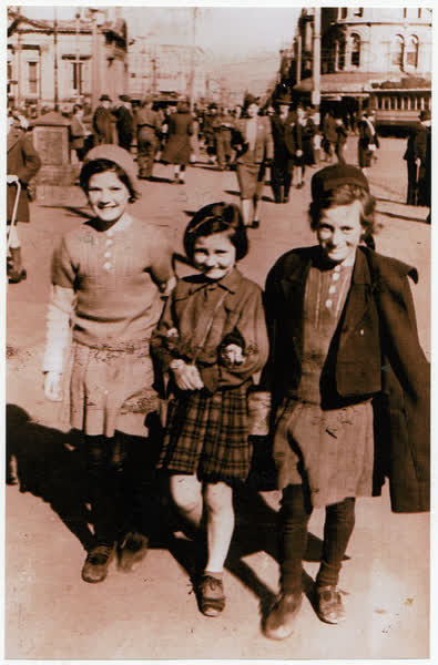 Three girls in Cathedral Square, 1942
