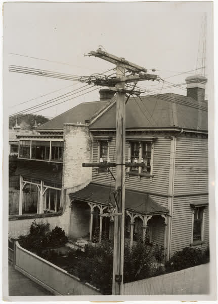 Street lamp outside houses, 1931