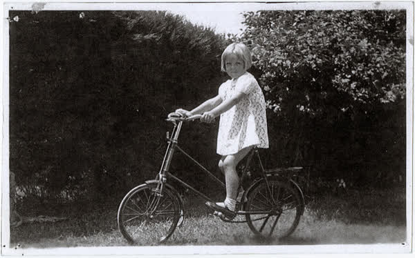 Connie Macefield on a bicycle, 1935