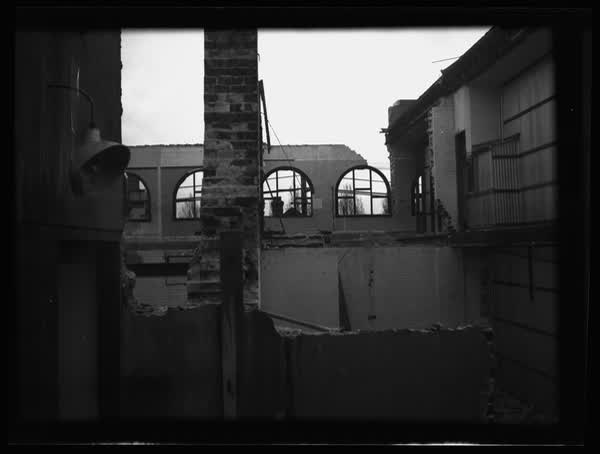 Looking north through remains of MED building, 1938