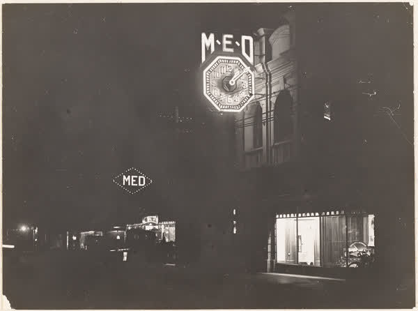 Electric lighting and clock on MED building, 1922