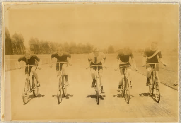 Five men racing bicycles, 1890