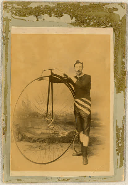 Nat Hall with a penny-farthing, 1890