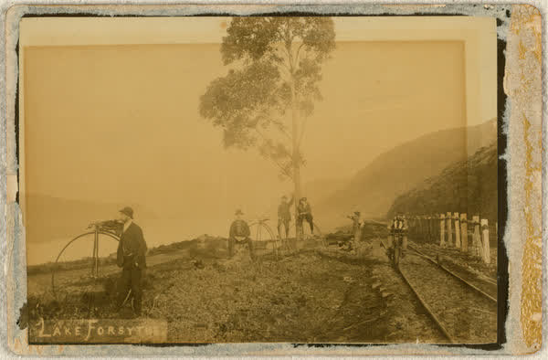 Six men by railroad beside Lake Forsythe, 1886