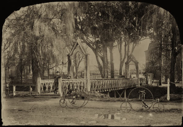 Unidentified man and two male child at Gloucester Street Bridge, 1885