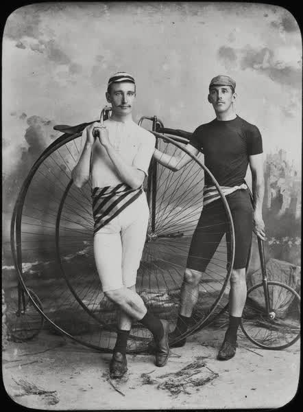 J. E. Fenlon and E. Mayes with penny-farthings, 1890