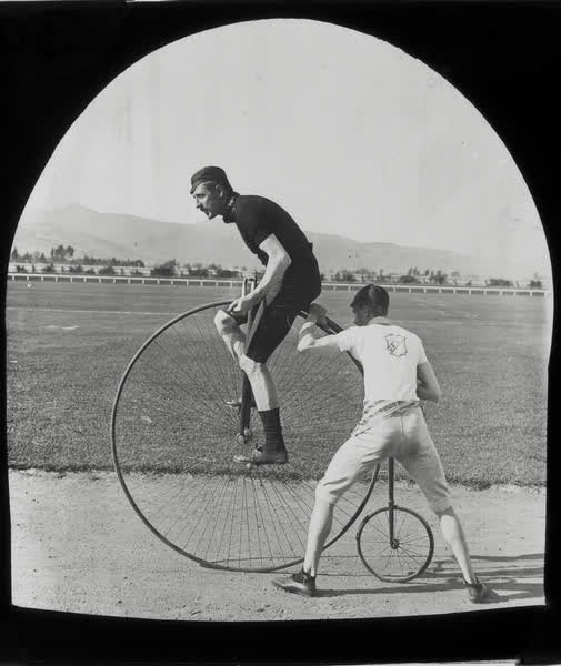 Fred Wood and W. Brown with a penny-farthing, 1880