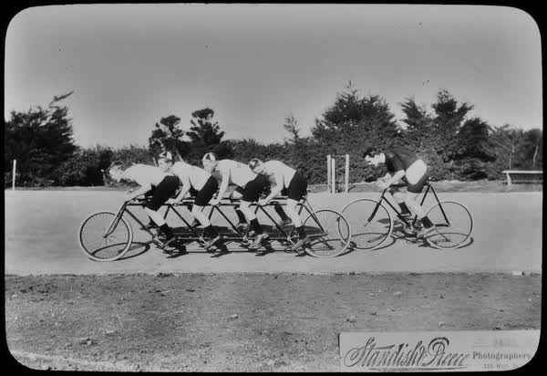 Ernest Archer and four unidentified men cycling at Lancaster Park, 1890