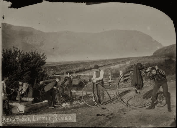 Five unidentified men using the ablutions at Little River, 1886