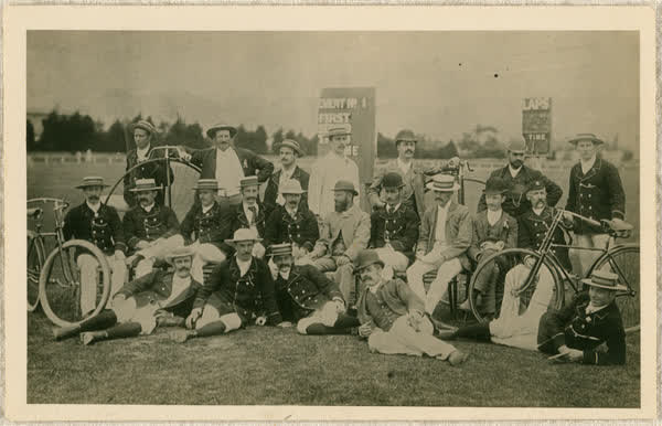 Group portrait of Pioneer Bicycle Club members at Lancaster Park, 1880