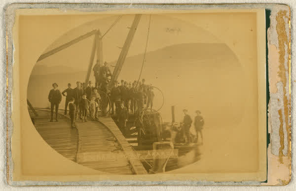 Group of unidentified men and children on Akaroa wharf, 1886