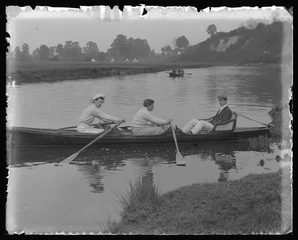 In a row boat, 1900
