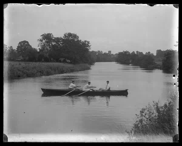 Rowing a row boat, 1900