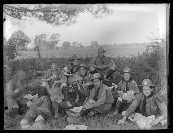 Boy scouts having a break, 1900