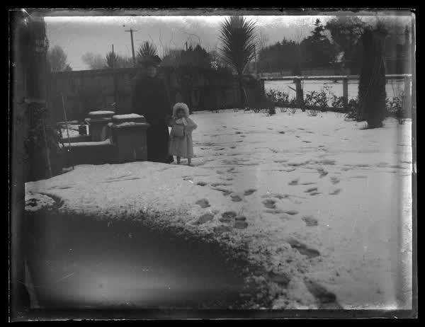 People in the snow, 1900
