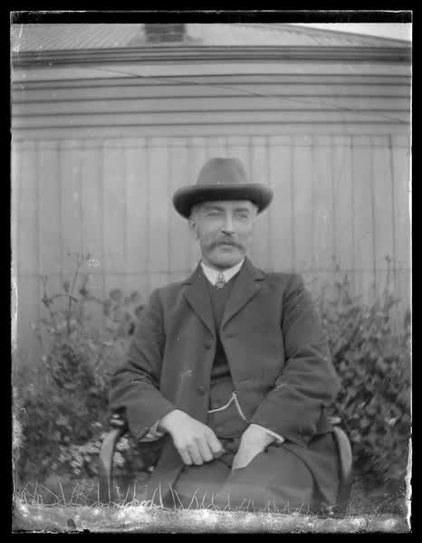 A man in a garden, 1900