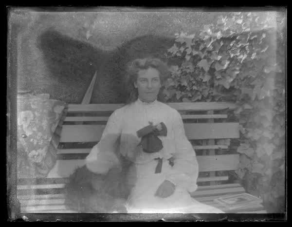 Woman on a bench, 1900
