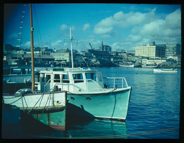 Boats in a harbour, 1900