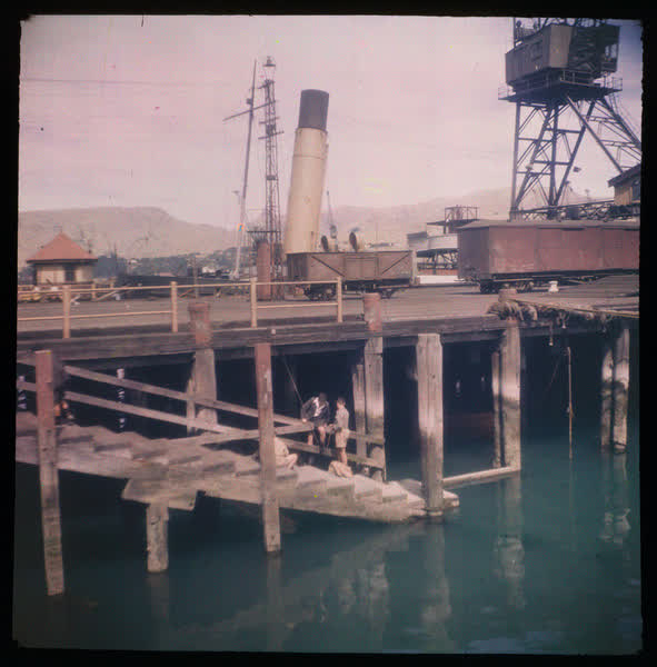 Children playing on the wharf, 1950