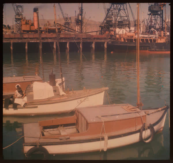 A man sitting in a boat, 1950