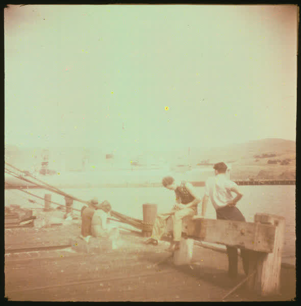 People relaxing on the wharf, 1950