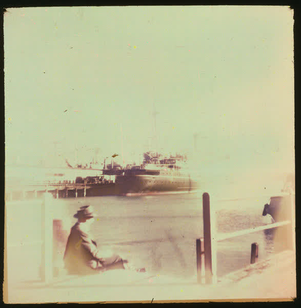 A man sitting on stairs, 1950