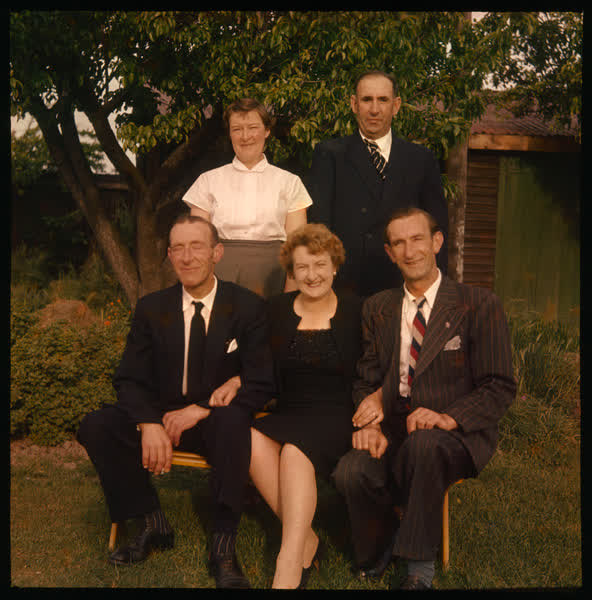 Portrait of people in a garden, 1950