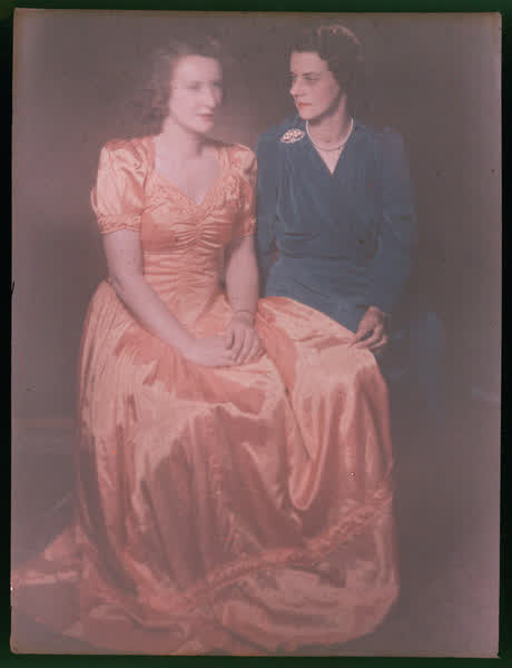 Two women sitting, 1950