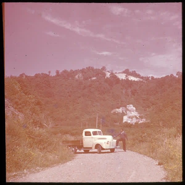 Truck on a gravel road, 1950