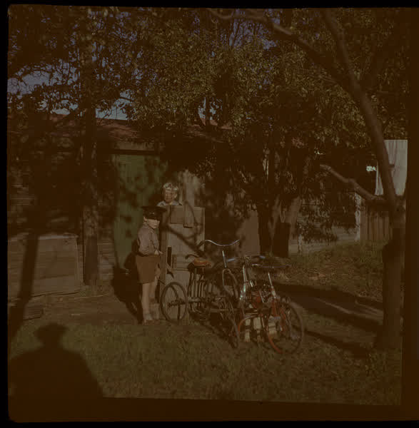 Two boys playing in the garden, 1950