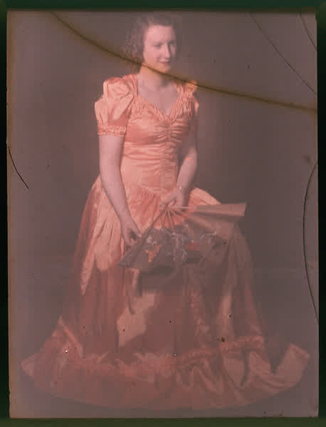 Woman in an orange gown, 1950