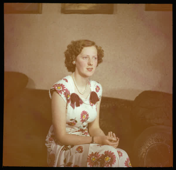Woman in a floral dress, 1950