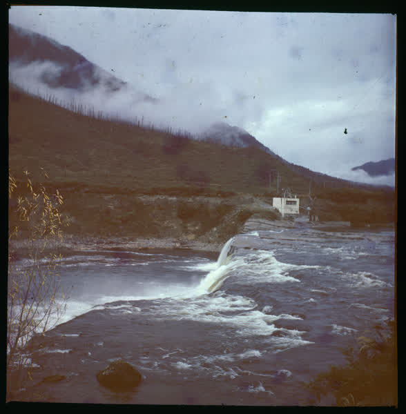 Building next to a river, 1900