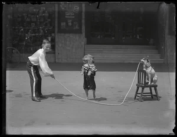 Pat Reno and two performing dogs, 1936