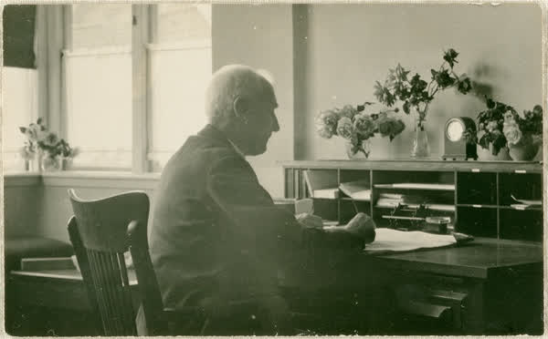 Dr Blackmore at desk in his Middle Sanatorium office, 1913