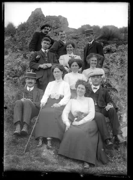 Group portrait on rocks, 1900