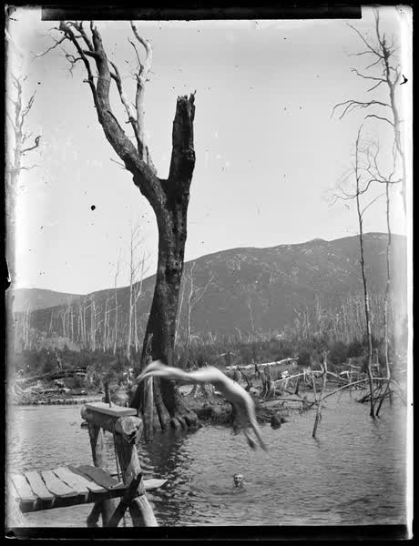 Man diving into water, 1900