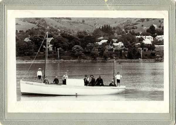 Four men and five children on a boatJan Shuttleworth collection, 1912
