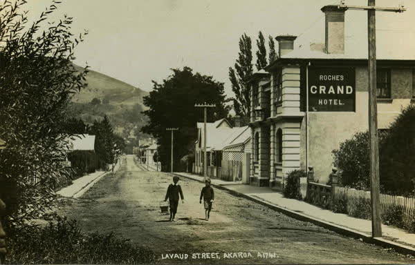 Two boys walking on Rue Lavaud outside Roche’s Grand HotelJan Shuttleworth collection, 1910
