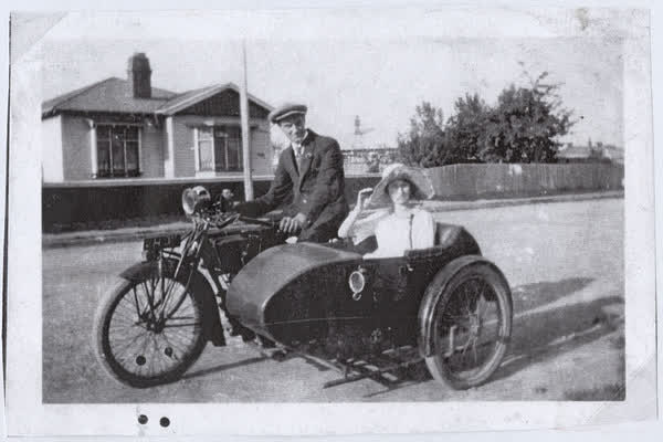 Motorcycle and a side car, 1930