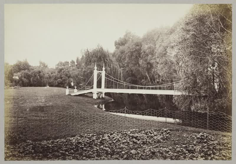 Unidentified bridge and garden, 1875